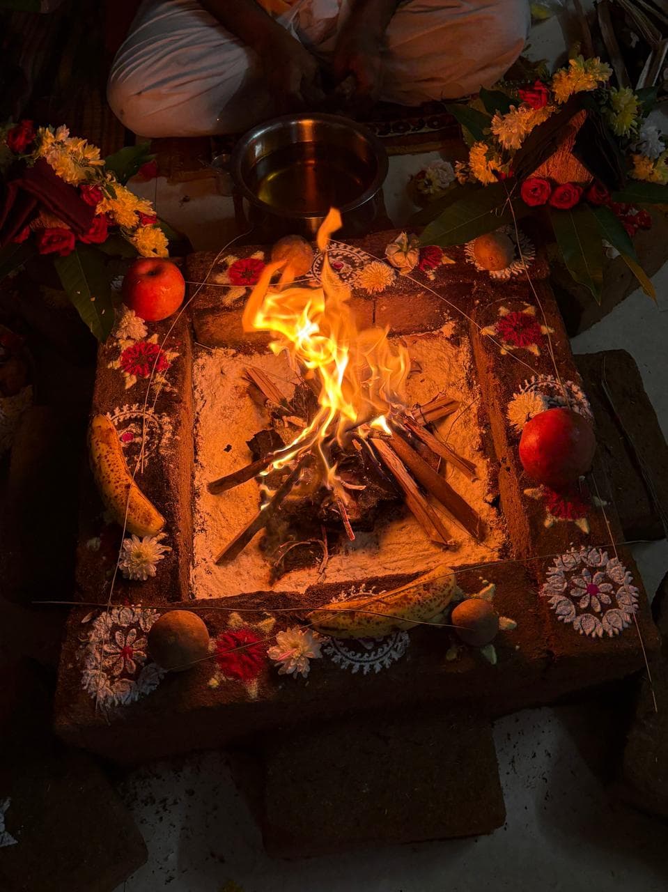 Sacred fire ceremony with flowers